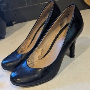 Kelly and Katie black patent pumps